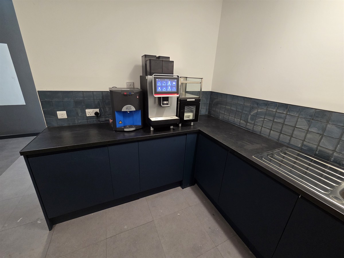 Tea Point - Office Fit-Out MediaCityUK Salford Fitted office tea point with bespoke joinery units and plumbed coffee station, office fit-out MediaCityUK Salford by JDCM Ltd