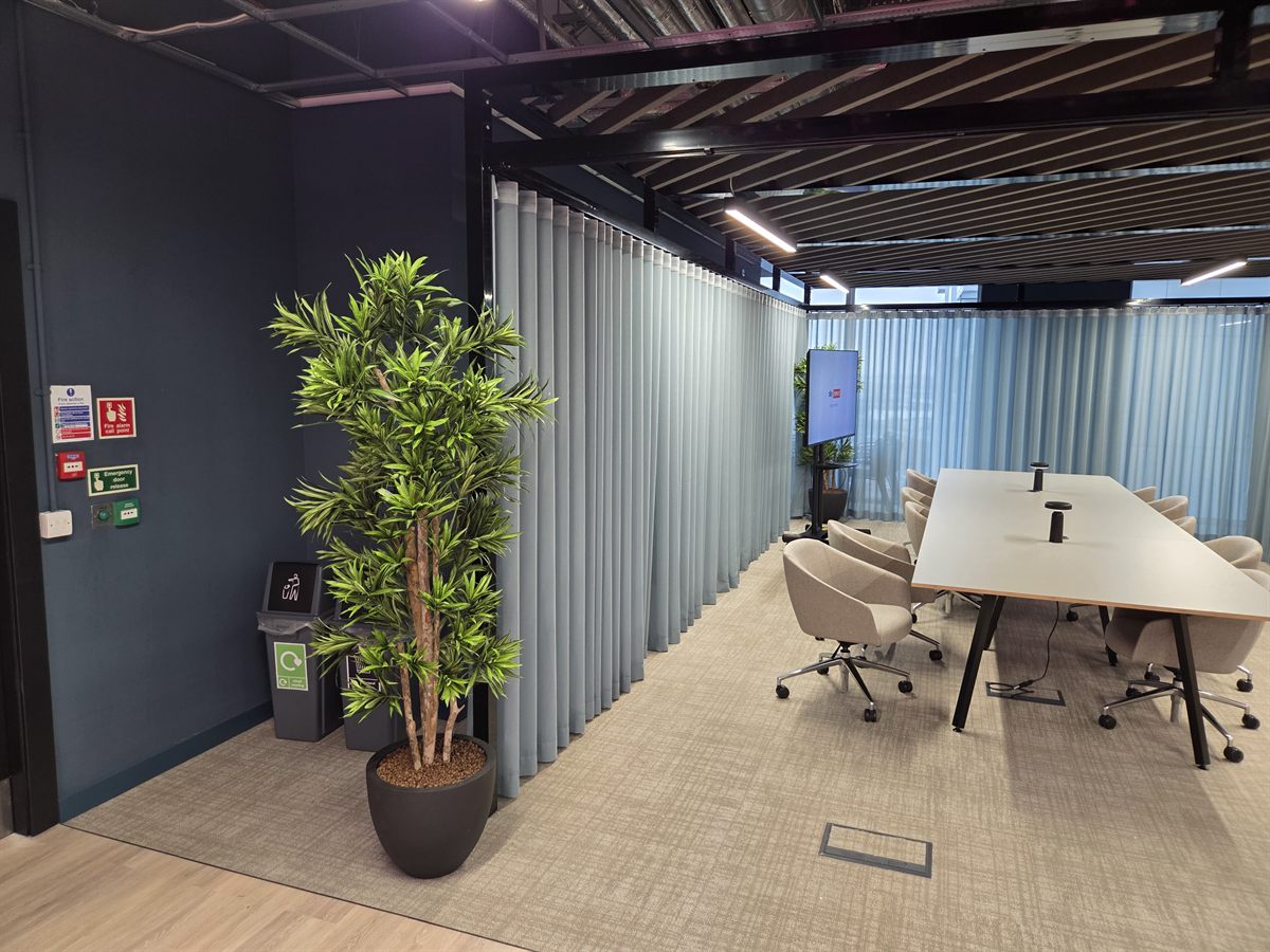 Meeting Room - Office Fit-Out MediaCityUK Salford Enclosed meeting room with soft acoustic partitioning and boardroom table, office fit-out MediaCityUK Salford by JDCM Ltd
